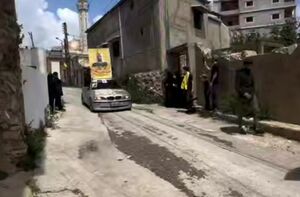 فیلم/ استقبال مادر شهید حزب الله از پیکر فرزندش