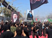 تصویر رهبر انقلاب در دست عزاداران دسته طویریج