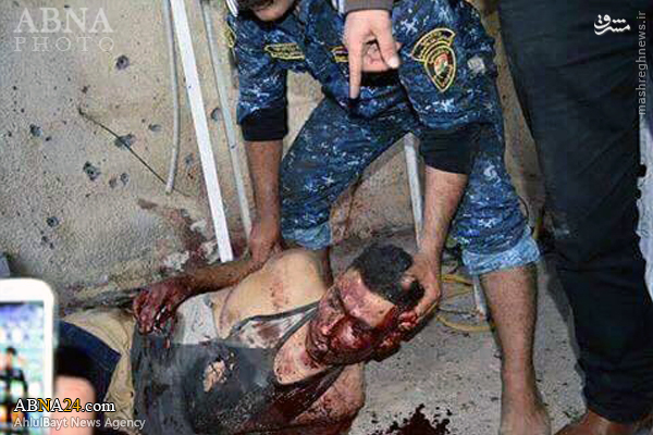 عکس/ جسد داعشی انتحاری در بغداد(18+)