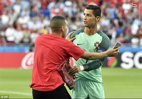 عکس/ حضور یک هوادار در عکس تیمی پرتغال