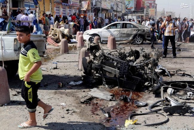 12 شهید و زخمی در انفجار بغداد+عکس