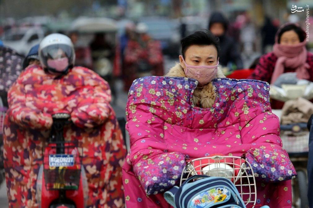 عکس/ پوشش جالب موتورسواران چینی برای مقابله با باد و سرما